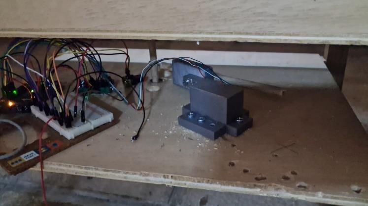 Load-cell, amplifier, and Arduino instrumentation mounted beneath the wind tunnel